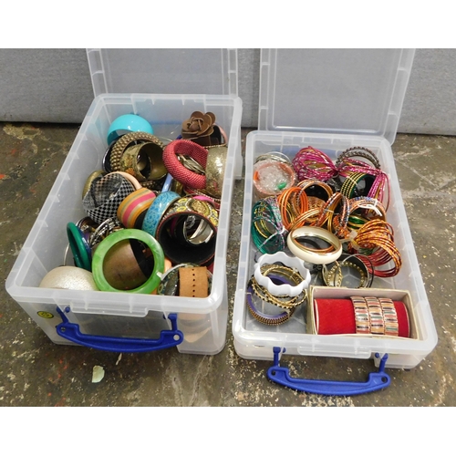 589 - Two boxes of mixed ladies bangles