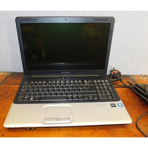 592A - Compaq laptop with charger (unchecked)