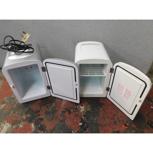 689 - Two mini fridges (unchecked)