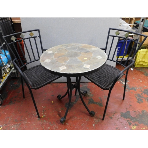 532 - Pair of metal garden chairs and matching circular patio table