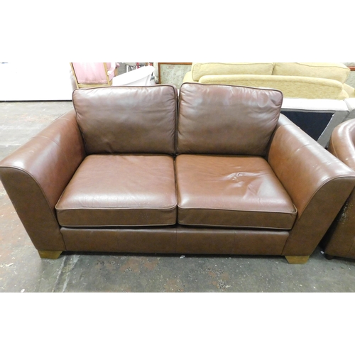 550A - Two seater leather settee and tub chair