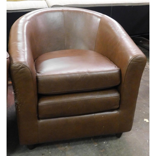 550A - Two seater leather settee and tub chair