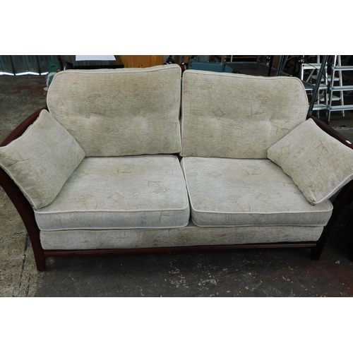 557 - Large two seater sofa and matching armchair