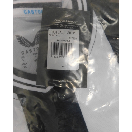 566 - New and bagged (size large) Newcastle FC shirt