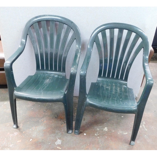 799 - Pair of plastic garden chairs