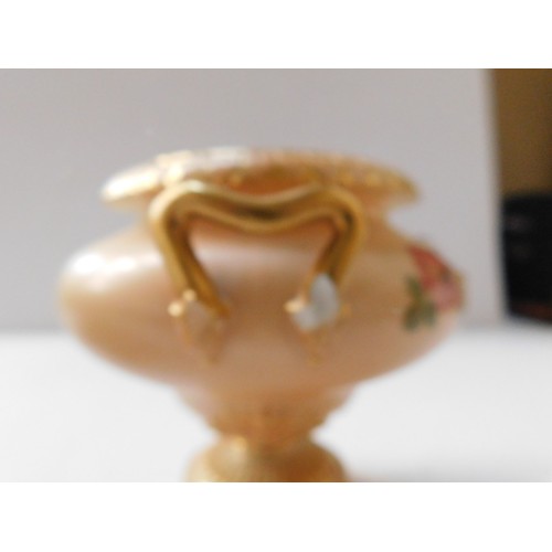 344 - Two Royal Worcester blush ivory pedestal vases with floral design  on with a chip to handle , see pi... 