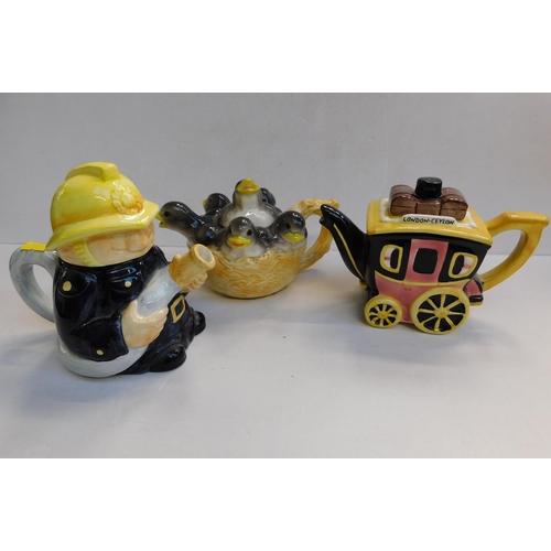 263 - Three - novelty teapots...