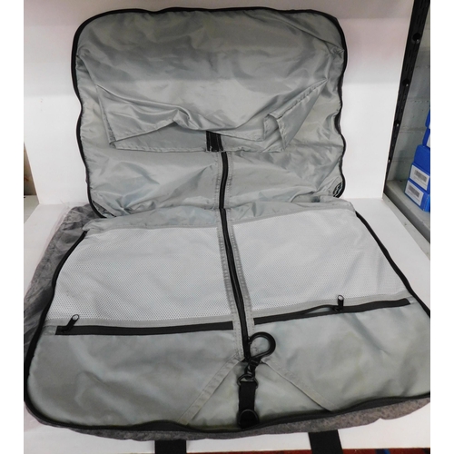 538 - Two new folding suit carrying cases