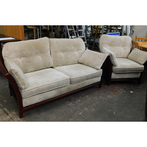 570 - Large two seater sofa and matching armchair