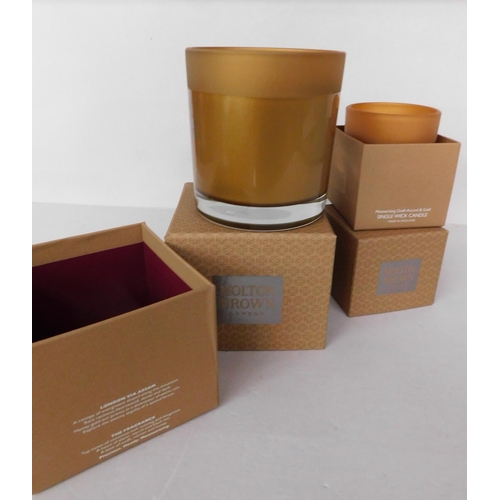 758 - New and boxed Molton Brown three wick and one wick candles - Mesmerising Oudh Accord and Gold