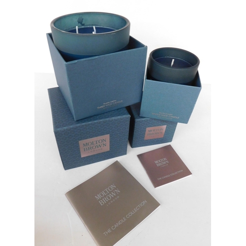 763 - New and boxed Molton Brown three wick and one wick candles - Russian Leather