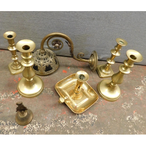 779 - Box of brass including candlesticks