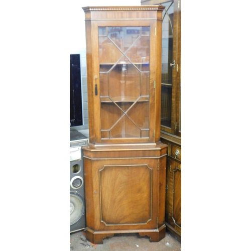 546 - Mahogany glass topped corner cabinet