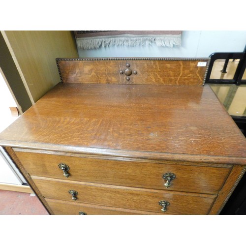 637 - Vintage oak four drawer chest on castors