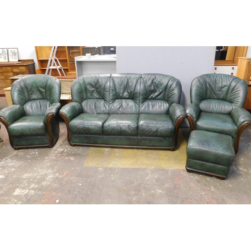 559 - Three seater Italian leather sofa with two matching armchairs and pouffe