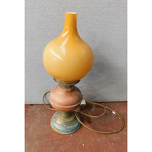 672 - Converted brass oil lamp