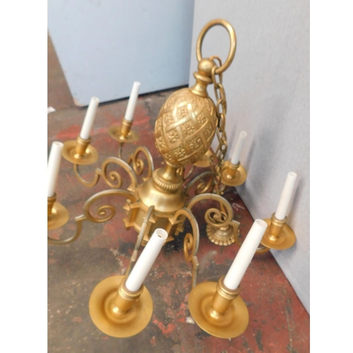 692 - Ornate gold coloured chandelier/ candle lights