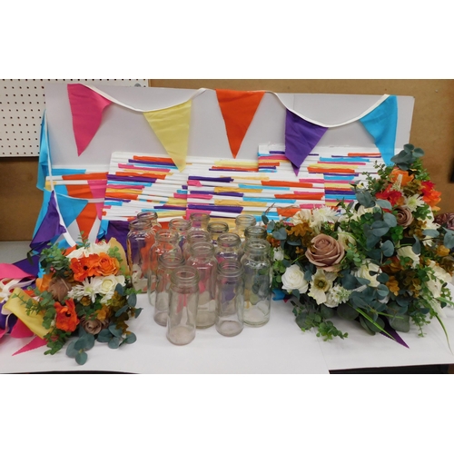 709 - Mixed wedding decorations, floral bouquets, centre pieces, glass jars, bunting (over 100 metres)