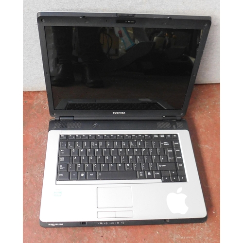 721 - Toshiba laptop - unchecked
