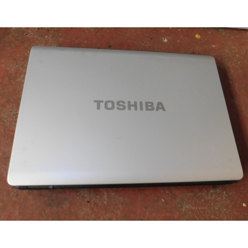 721 - Toshiba laptop - unchecked