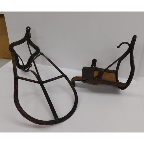 779 - 2 Metal saddle stands