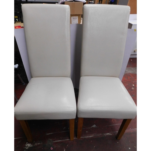 809 - Pair of cream faux leather chairs