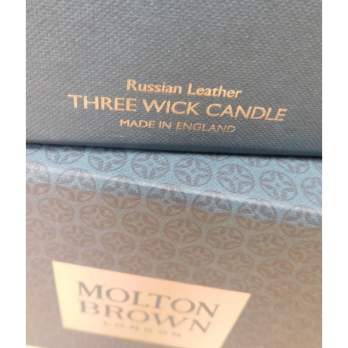 755 - Molton Brown three wick candle and single wick candle - Russian Leather