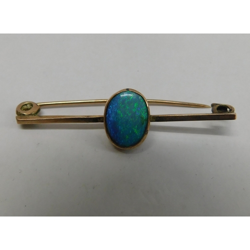 266 - 9ct gold - opal set/brooch