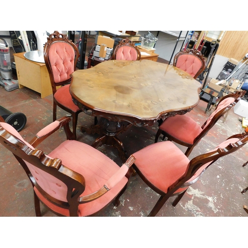 568 - Italian inlaid table and six chairs incl. two carvers