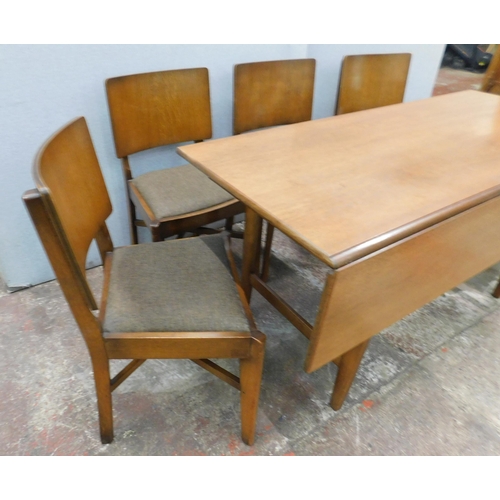 570 - Mid-century teak drop leaf table and five chairs