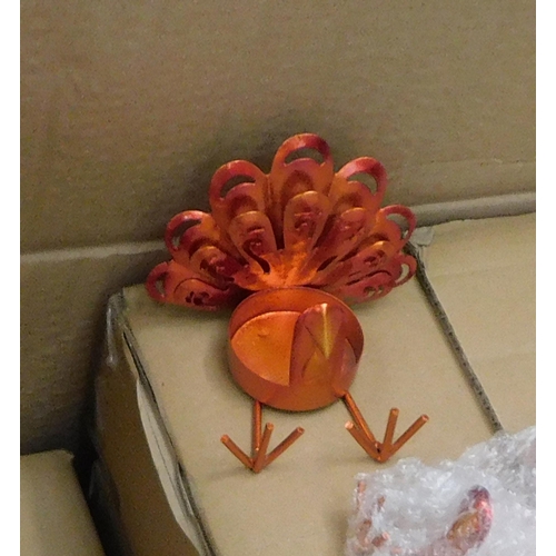 702 - Eight boxes of tea lights - bird design - 10 pieces per box