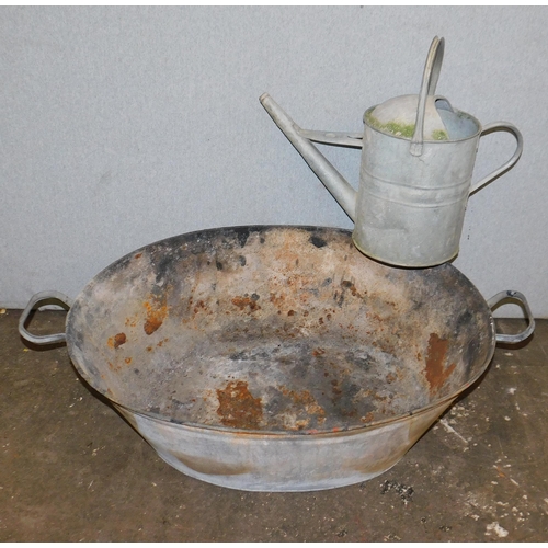 818 - Large round tin bath and watering can