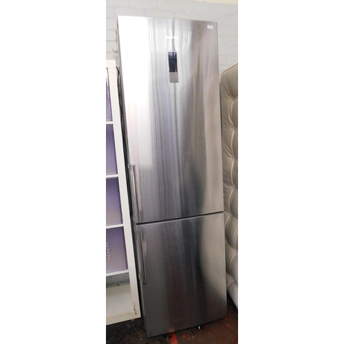 554 - Kenwood silver fridge freezer in working order