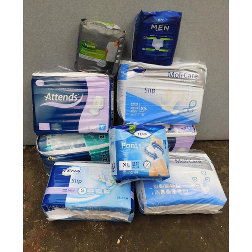 736 - Selection of nine various new Tena pads packs etc