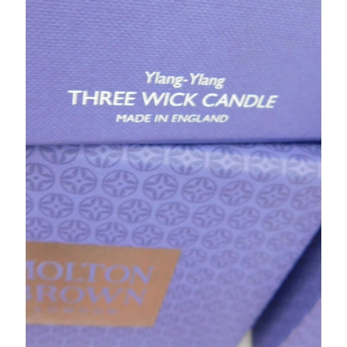 752 - Two new and boxed Molton Brown candles, three wick and single wick - Ylang Ylang