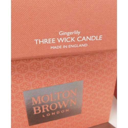 755 - Two new and boxed Molton Brown candles, three wick and single wick - Gingerlily