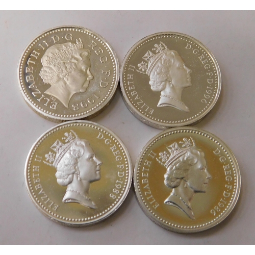 218 - Four - silver proof/One Pound coins