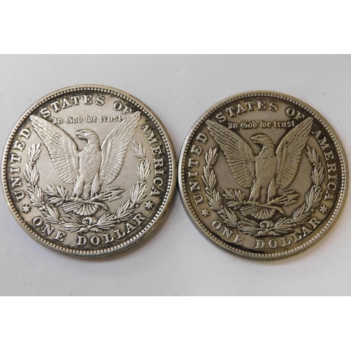 241 - Two - antique American/silver Dollars - dated 1884 & 1885 - (combined weight 54.20g)