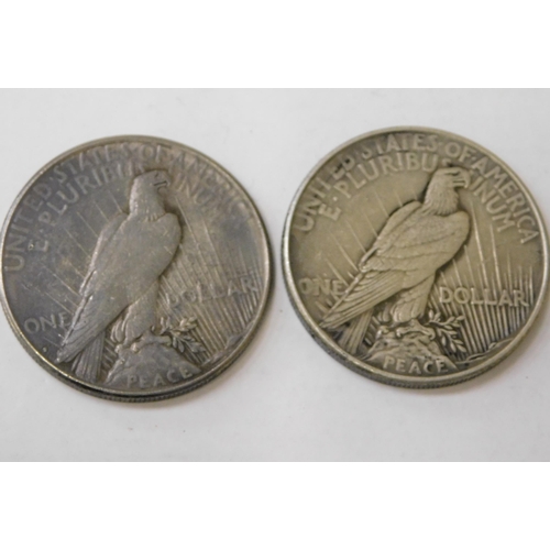 317 - Two - antique American/silver Dollars - dated 1934 & 1935 - (combined weight 53.53g)