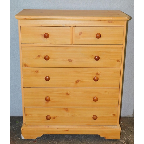 546 - Pine effect two over four chest of drawers