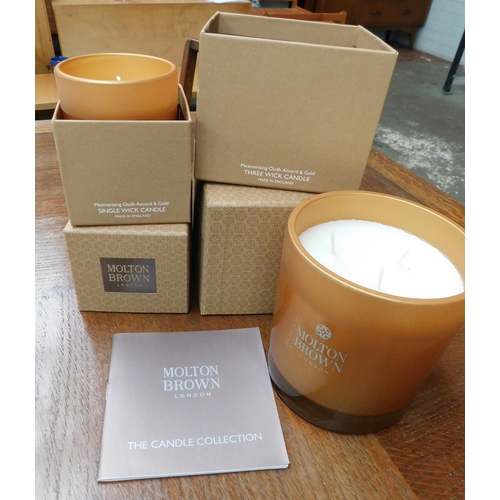 760 - Molton Brown three wick and single wick candles - new and boxed - Mesmerising Oudh Accord and Gold