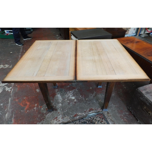 828 - Oak fold out dining table