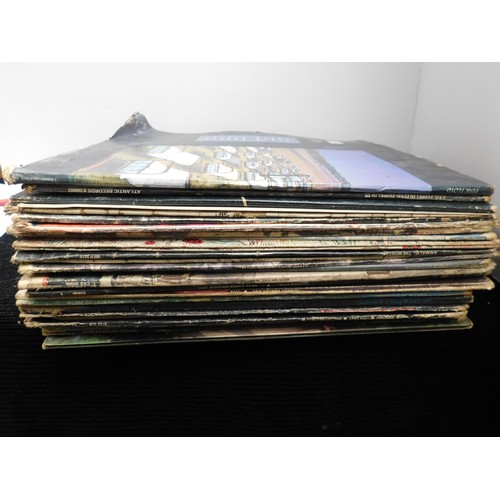 33 - Mixed vinyl including - The Rolling Stones/Thin Lizzy/ Fleetwood Mac & The Beatles