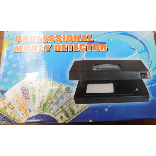 610 - New in box professional money detector...