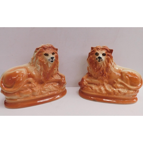 30 - Staffordshire - ceramic lions with glass eyes - approx. 10