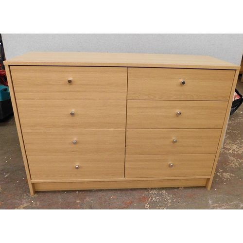 545 - Light oak coloured eight drawer unit