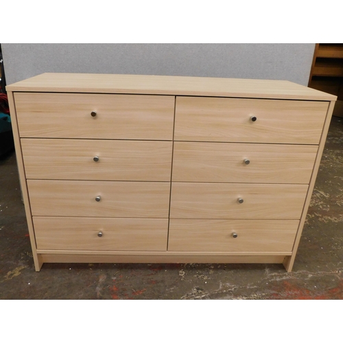 546 - Beech coloured eight drawer unit