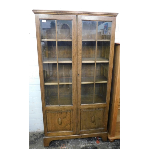 548 - Oak bookcase with glazed door