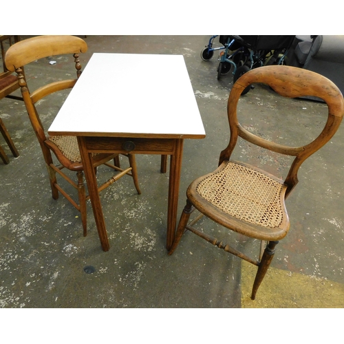 566 - Vintage melamine table and two rattan chairs