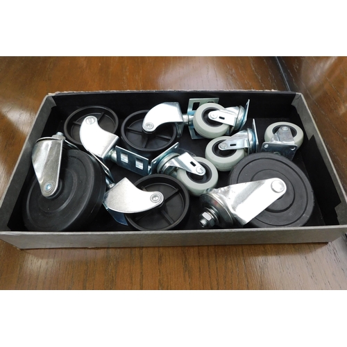 603 - Nine assorted castors